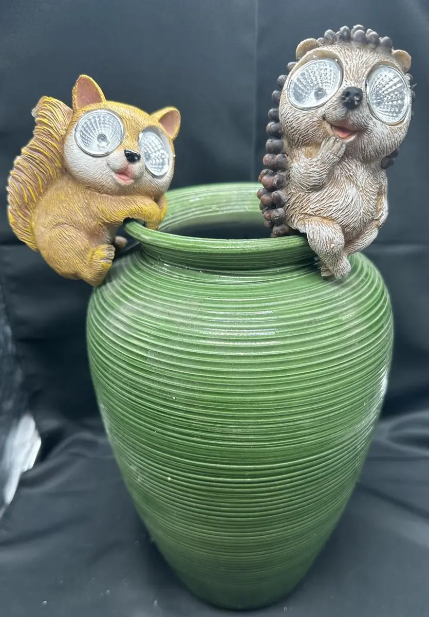 Polyresin solarlamp pothanger "konijn & wasbeer"