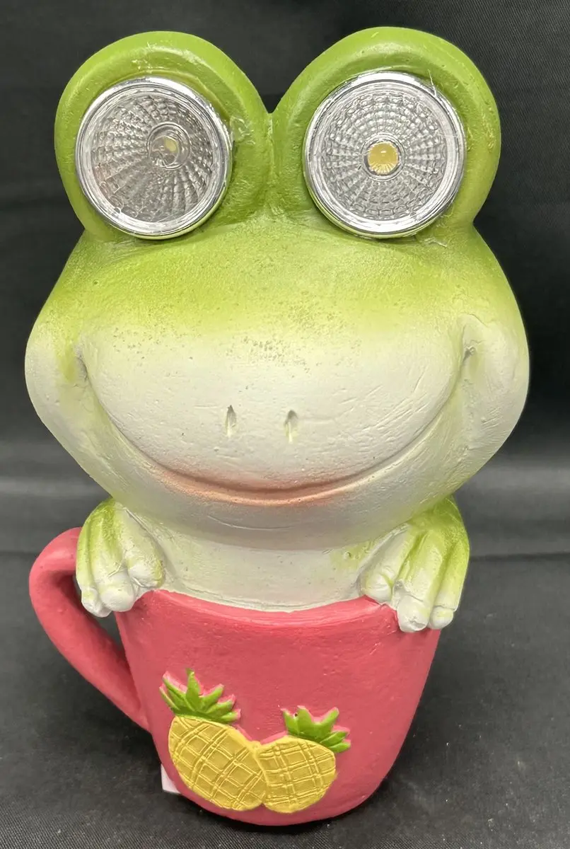Polyresin solarlamp "kikker in kop met ananassen"