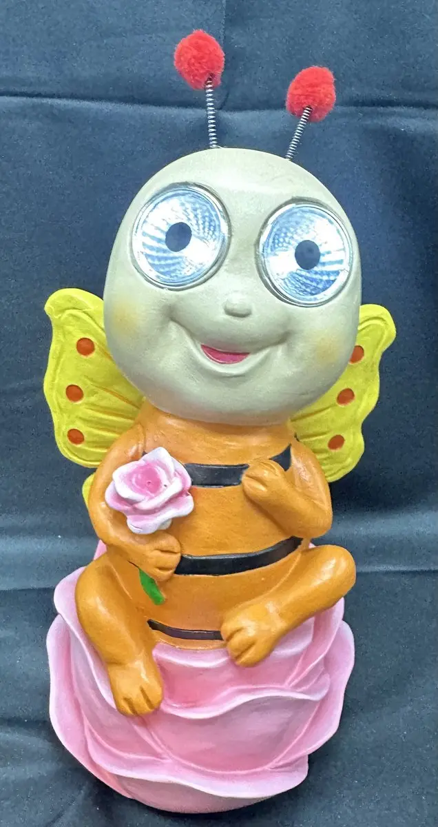 Polyresin solarlamp " Bij oranje met gele vleugels en roze bloem"
