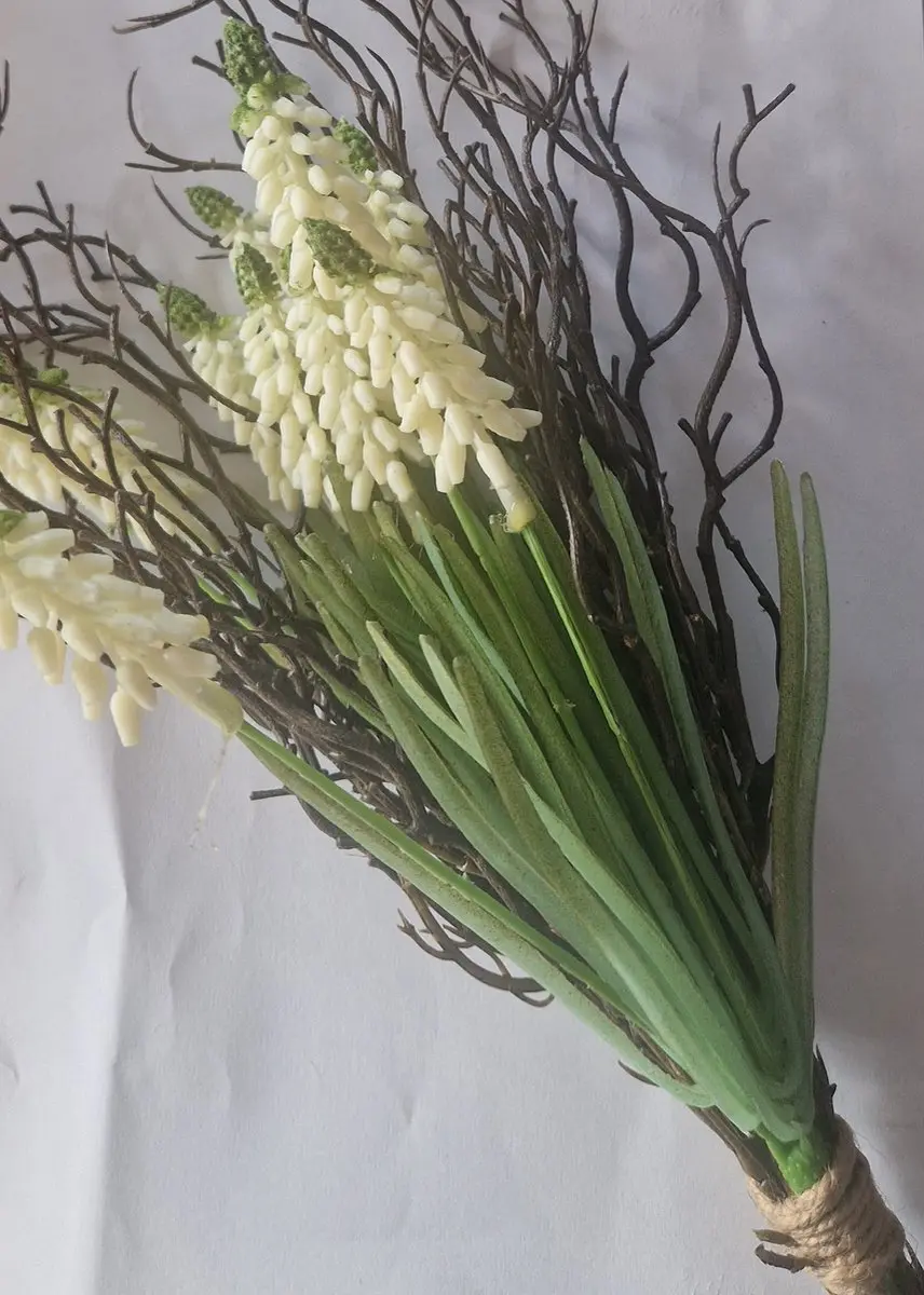 Kunst witte druifjes met twijgjes