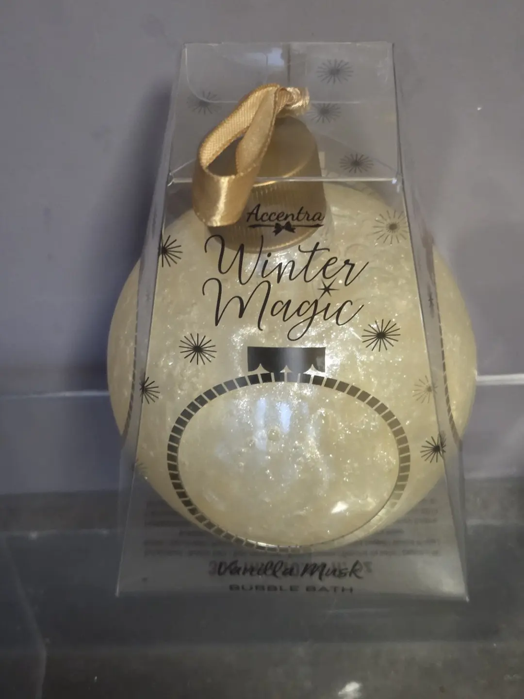 kertst bal met douche gel met de geur van vanille en musk