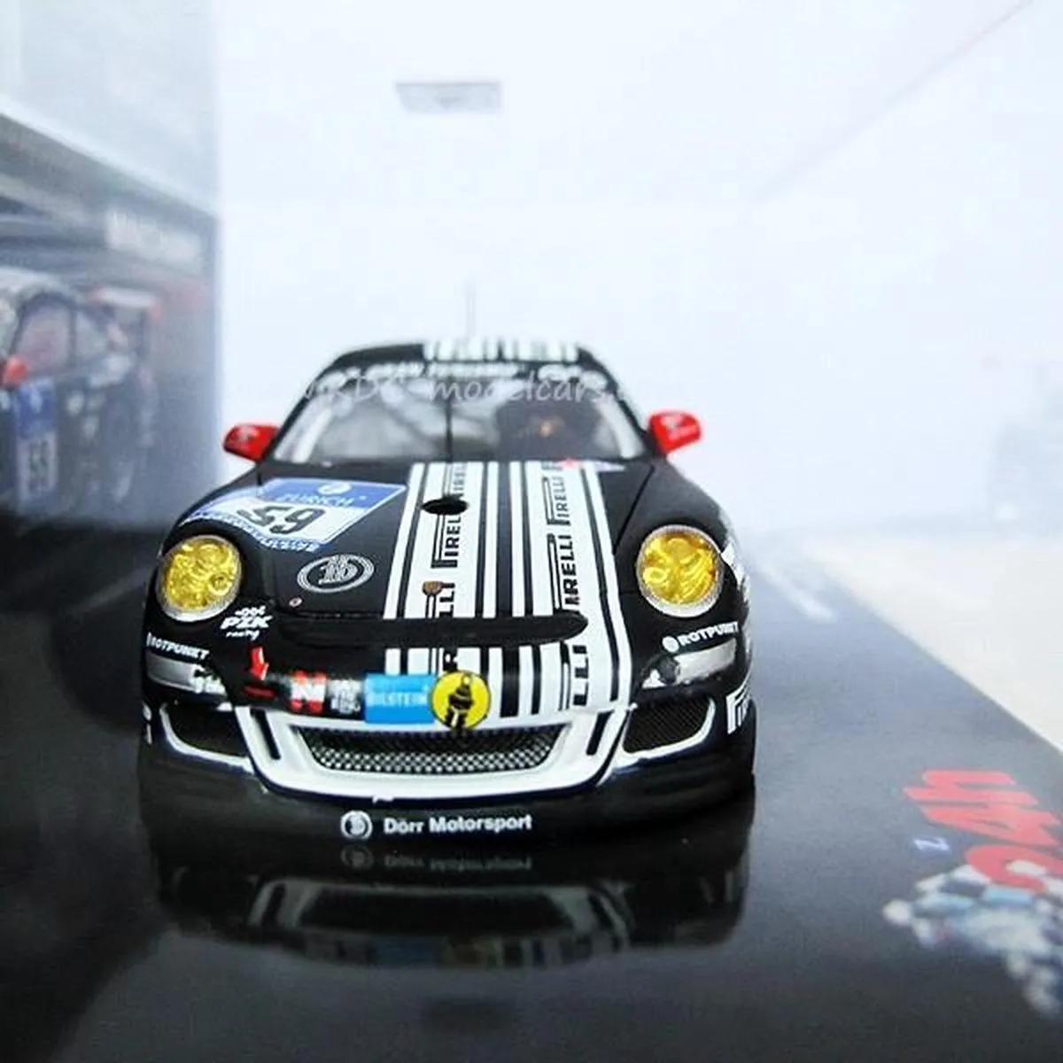 Porsche 911 GT3 R #59 24h Nürburgring 2011 - 1:43 Minichamps - Zwart