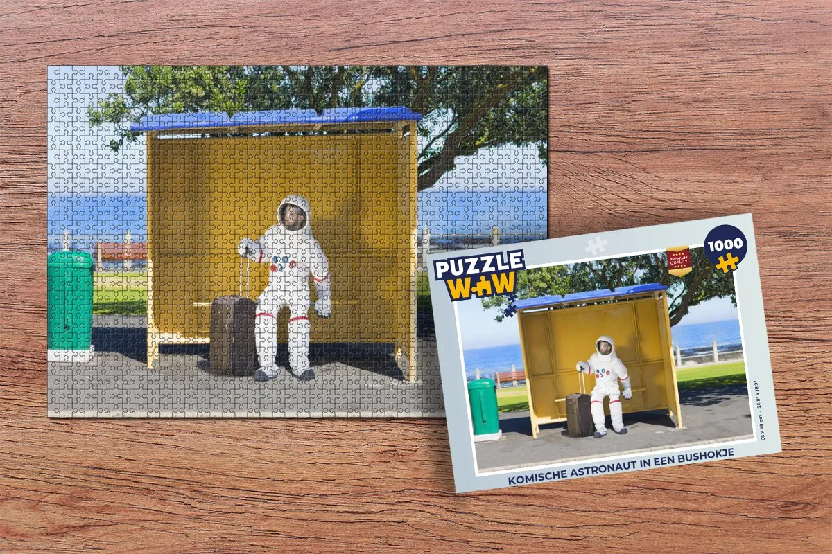 PuzzleWow Komische Astronaut Bushokje Legpuzzel 1000 Stuks - Multicolor