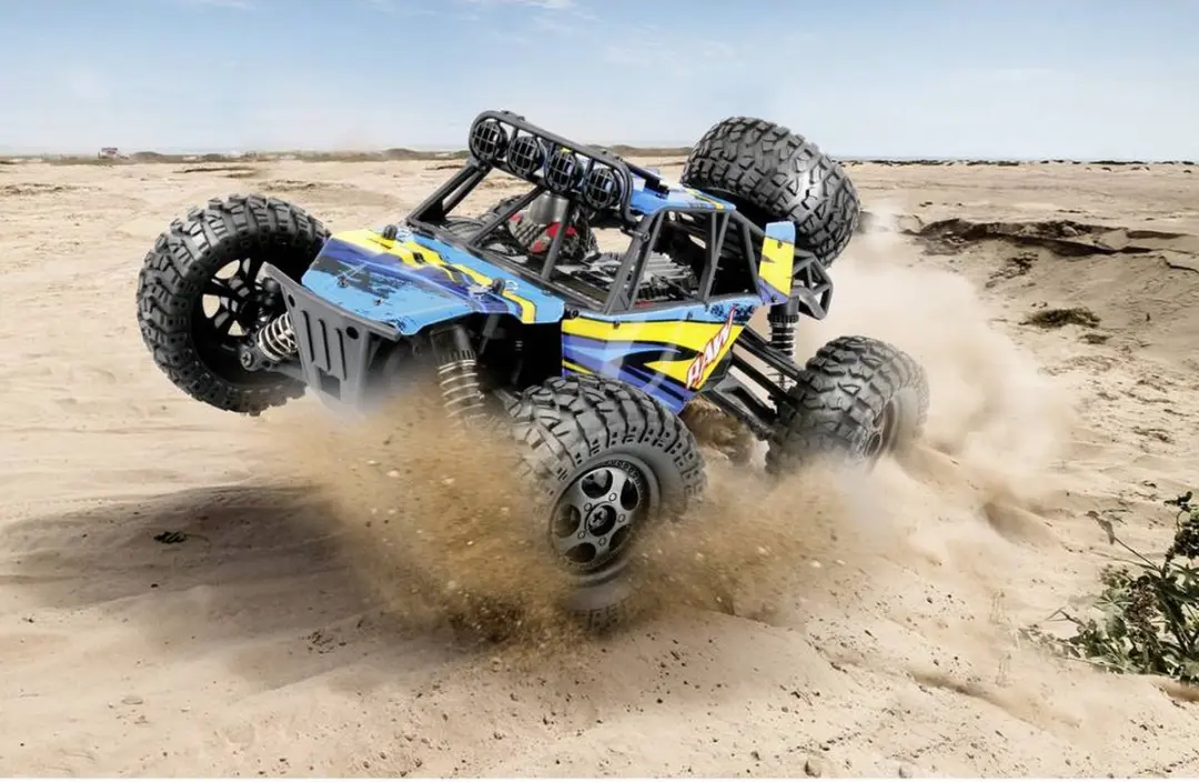 Reely RAW Oranje Brushed 1:14 RC auto Elektro Monstertruck 4WD RTR 2,4 GHz Incl. accu en lader - afbeelding 5 van 6