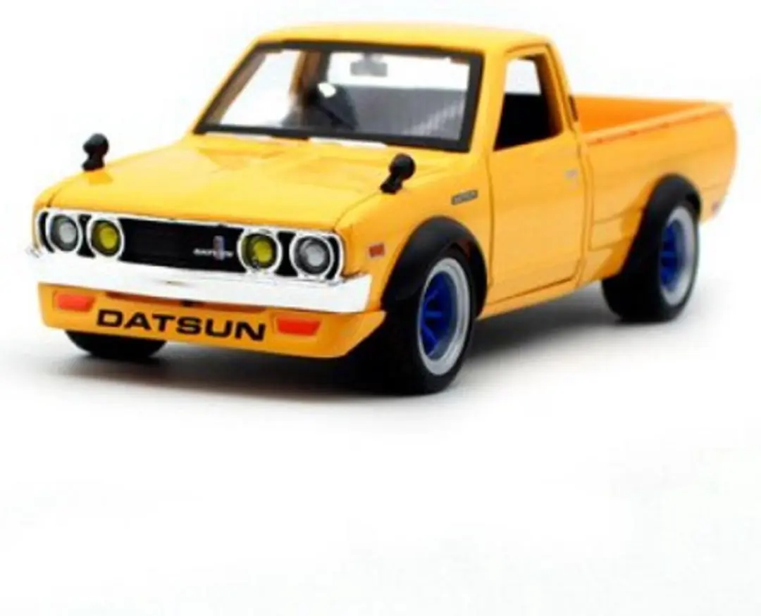Datsun 620 Pick Up 1973 Geel 1-24 Maisto