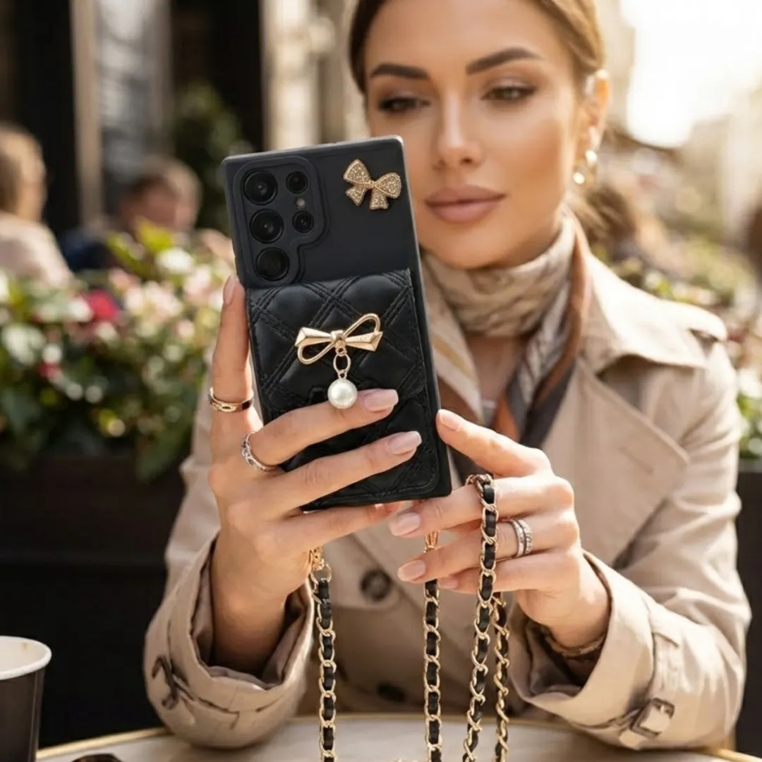 NUVEX Hoesje Samsung Galaxy S25 Ultra - Zwart - Lederlook met goud parelstrik