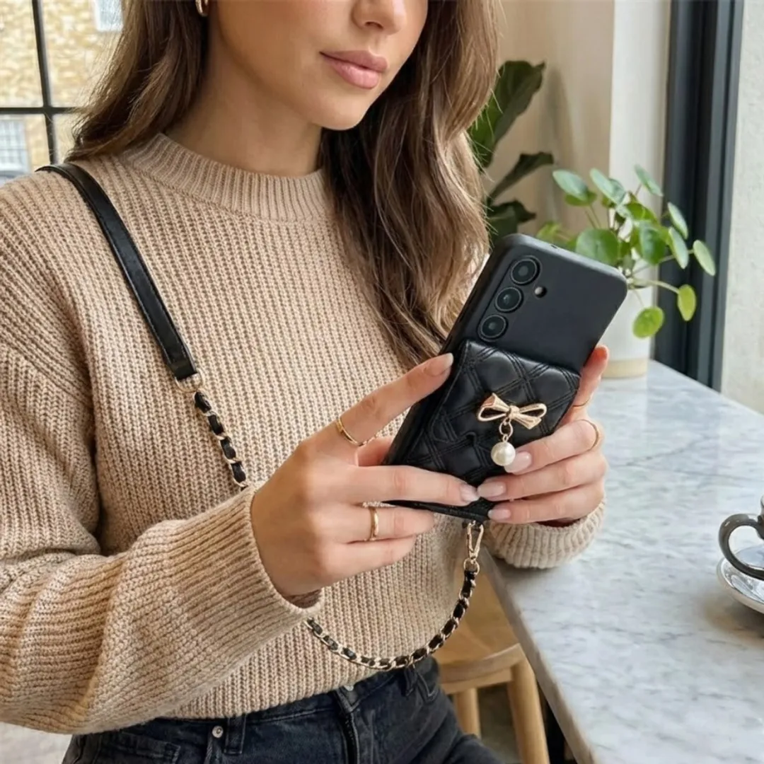 NUVEX Hoesje Samsung Galaxy A55 - Zwart - Lederlook met goudkleurige strik