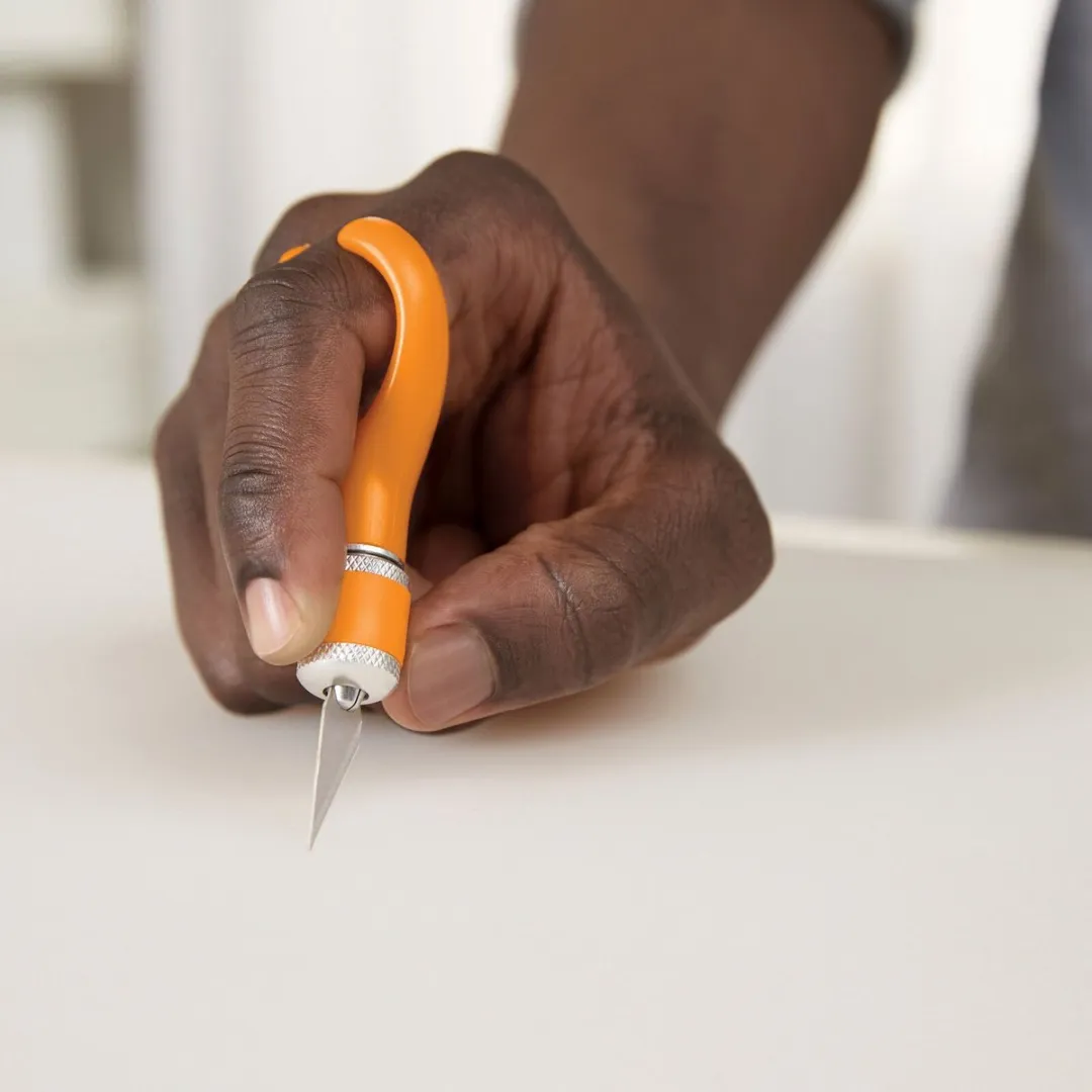 Fiskars Fingertip Knutselmes Oranje 10x3,5cm - 1 Mes + 1 Reservemes