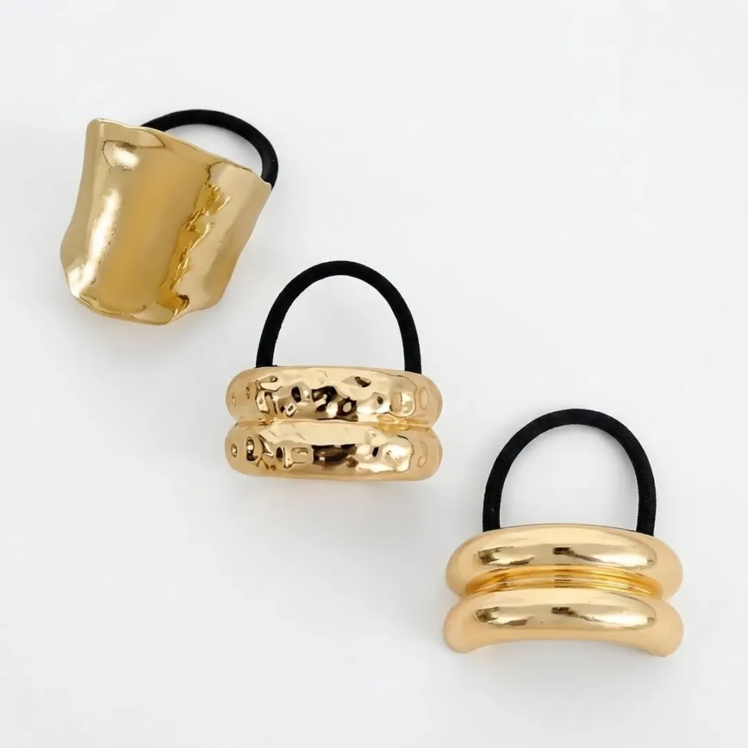 NUVEX Goudkleurige Haarband Cuff