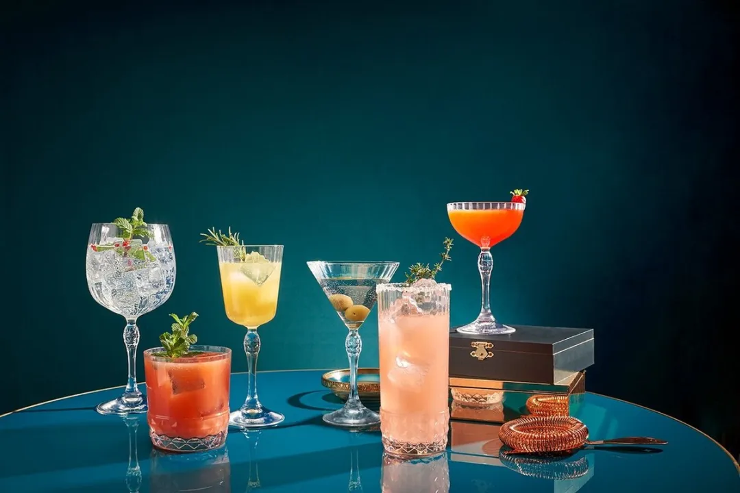 ​Bormioli Rocco Gin Tonic Glazen America 20's - 740 ml - Set van 4 Copa Glazen / Cocktailglazen - Vintage Jaren '20 Design - Kristalhelder Glaswerk - Duurzaam & Vaatwasserbestendig voor Gin-Tonics en Cocktails​