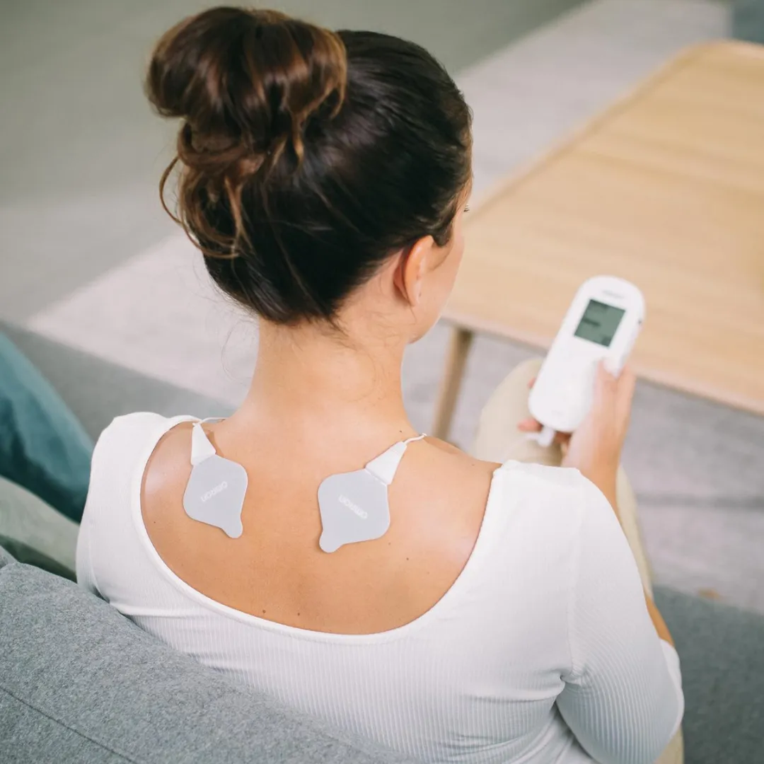 Omron HeatTens HV-F311-E TENS apparaat - Elektrodenstimulatie met warmte - Wit
