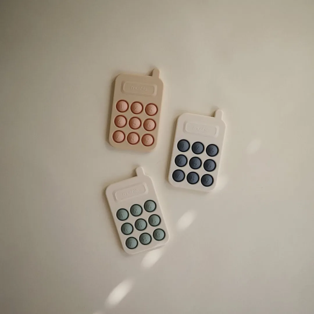 Mushie Pop It Telefoon Sensorisch Speelgoed 8100052465845 - Tradewinds
