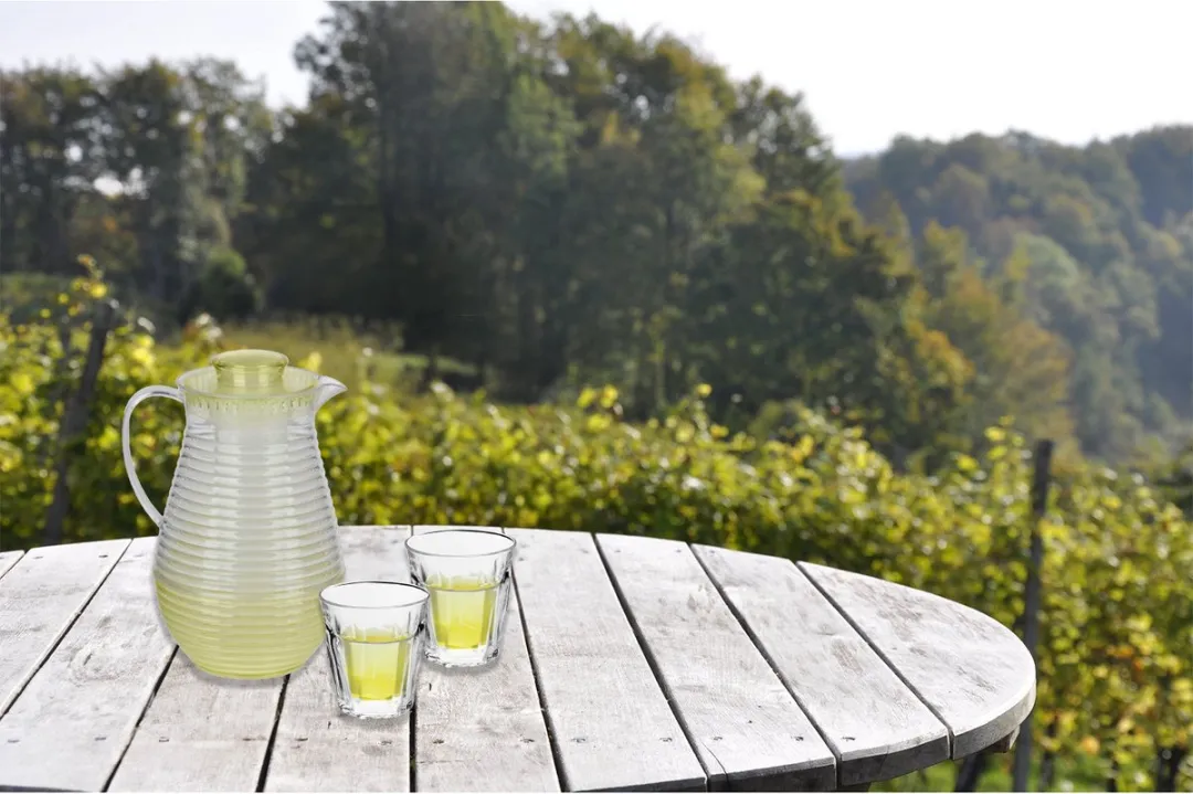 Alpina Waterkan met infuser 2L - Geel