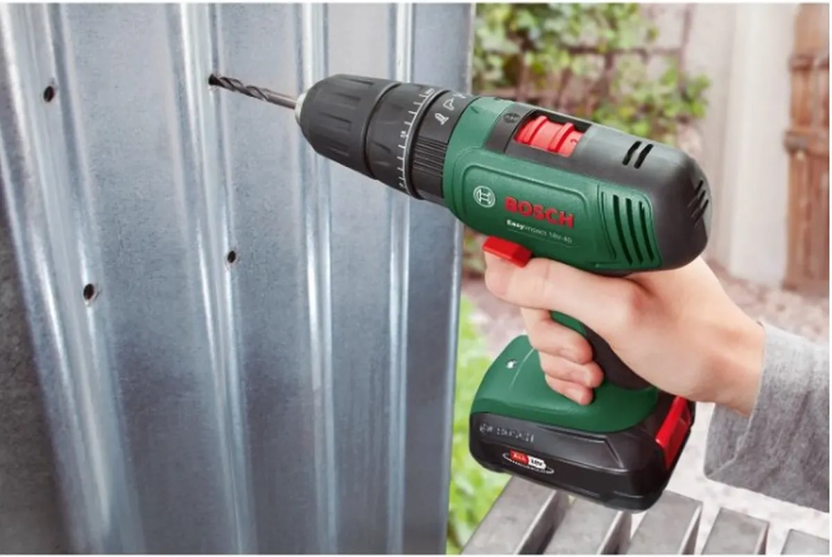 Bosch 06039D810A Accuboormachine Klopfunctie + Decoupeerzaag Toolkit 18V - 2x 2000mAh