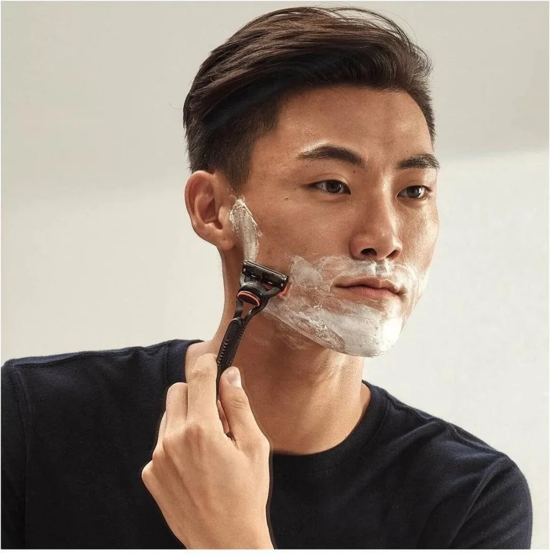 Gillette Fusion Scheersysteem - 10 Mesjes - Oranje/Zwart