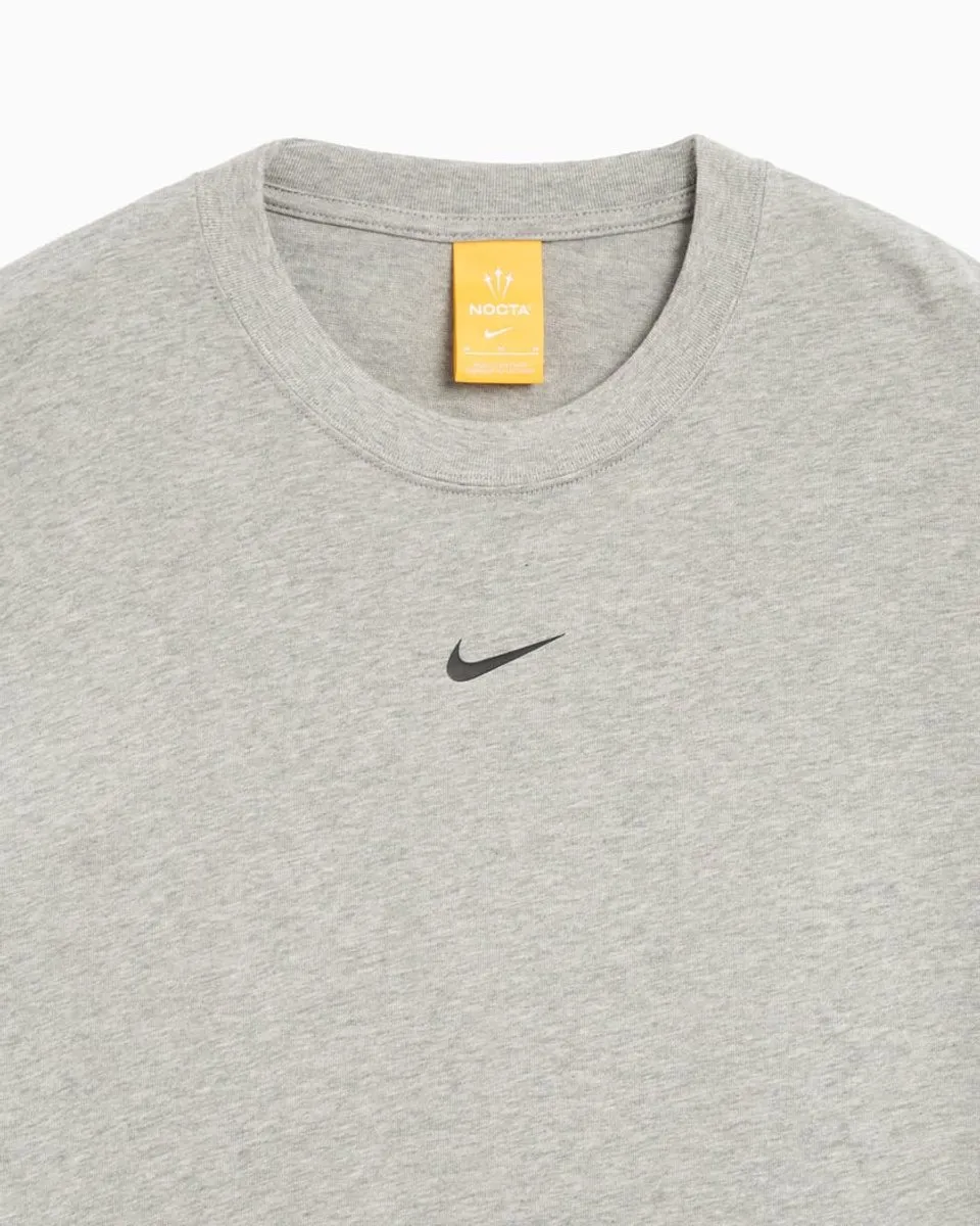 Nike NOCTA T-Shirt FN7663-063 - Grijs