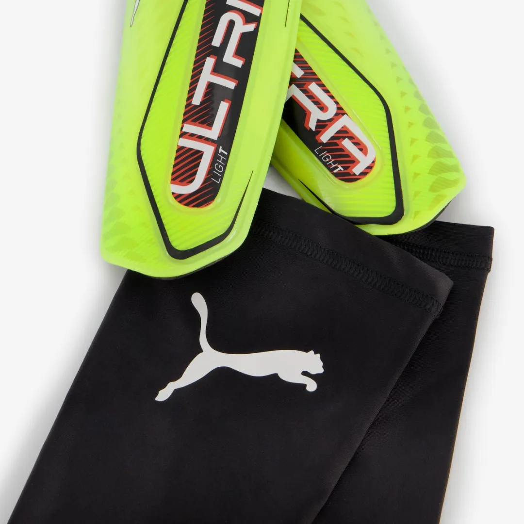 PUMA Ultra Light Sleeve Scheenbeschermers - Geel/Zwart - Maat S