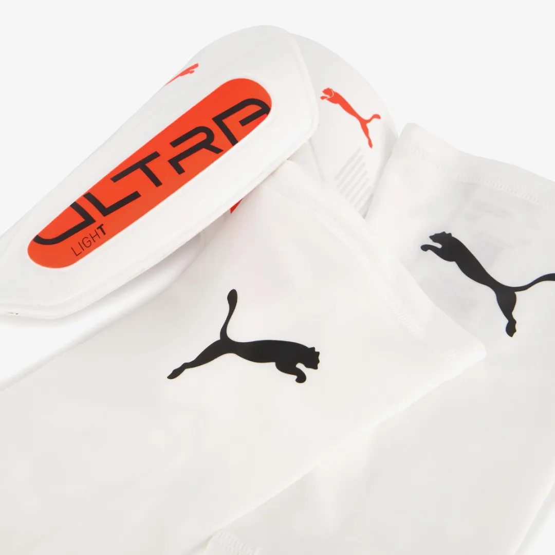 PUMA Ultra Light Sleeve Scheenbeschermers - Maat M - Wit/Rood