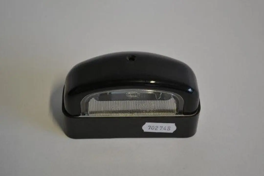 Hella Kentekenverlichting Rond - Zwart/Wit