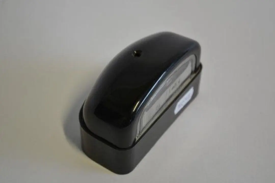 Hella Kentekenverlichting Rond - Zwart/Wit