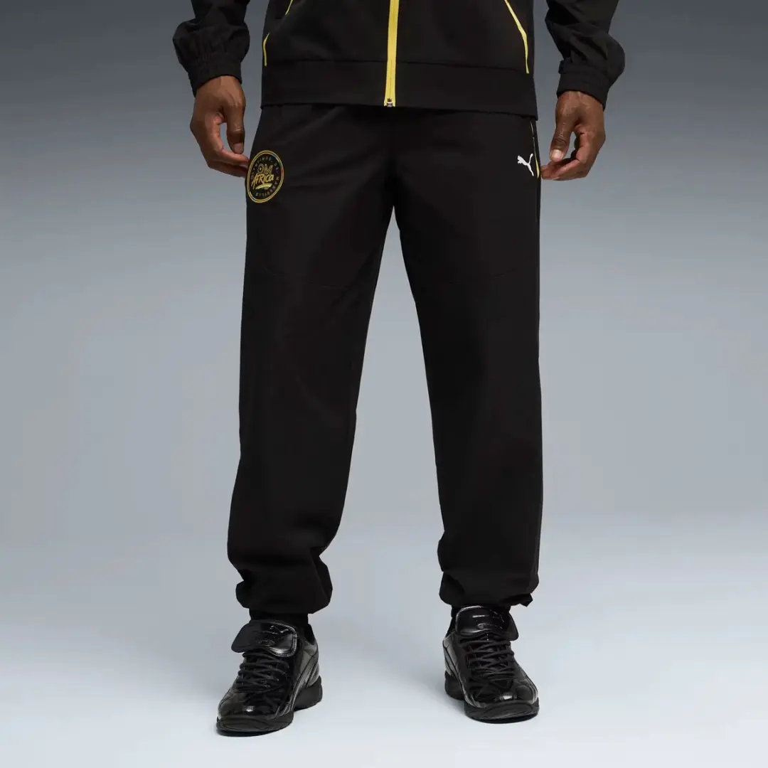 PUMA OM Africa Tech Trainingsbroek L - Zwart
