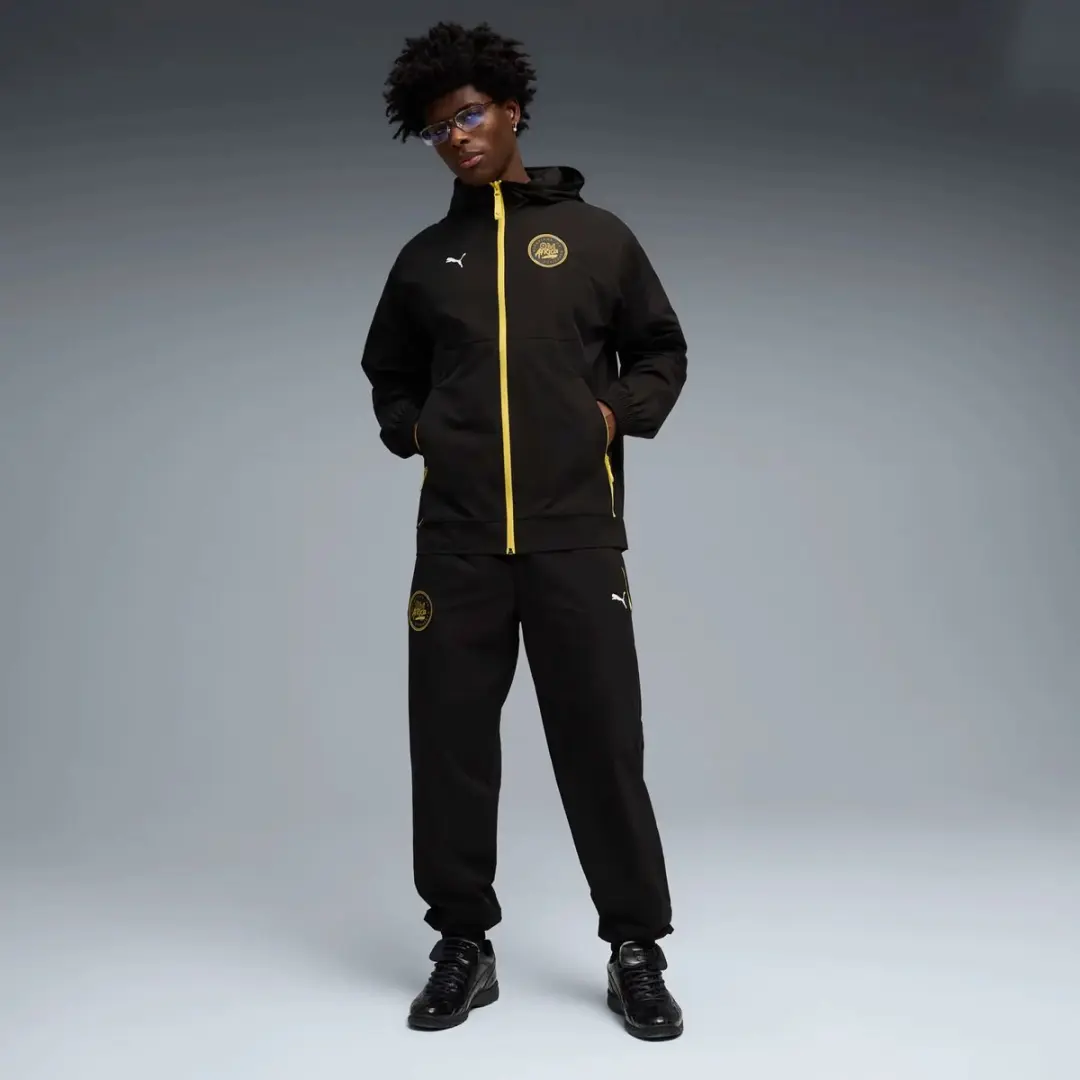 PUMA OM Africa Tech Trainingsbroek L - Zwart