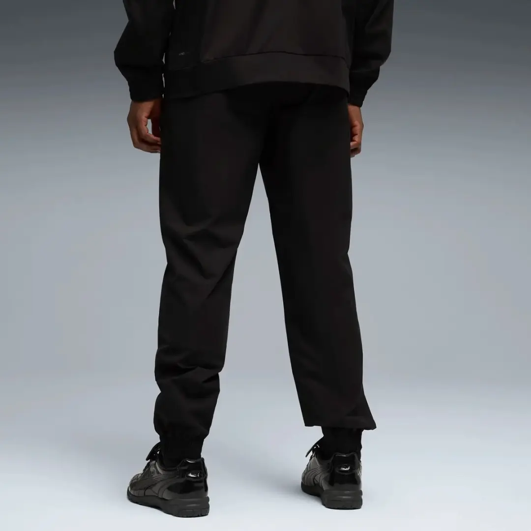 PUMA OM Africa Tech Trainingsbroek L - Zwart