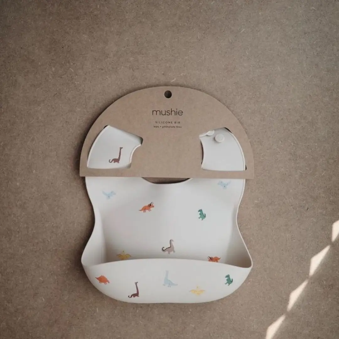Mushie Siliconen Baby Slabbetje Dino - BPA/ftalaatvrij