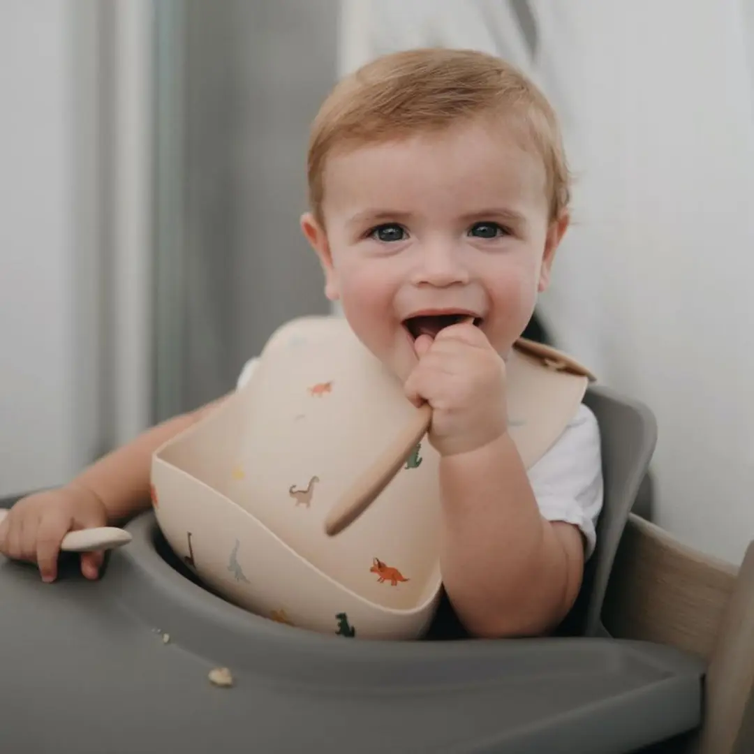 Mushie Siliconen Baby Slabbetje Dino - BPA/ftalaatvrij
