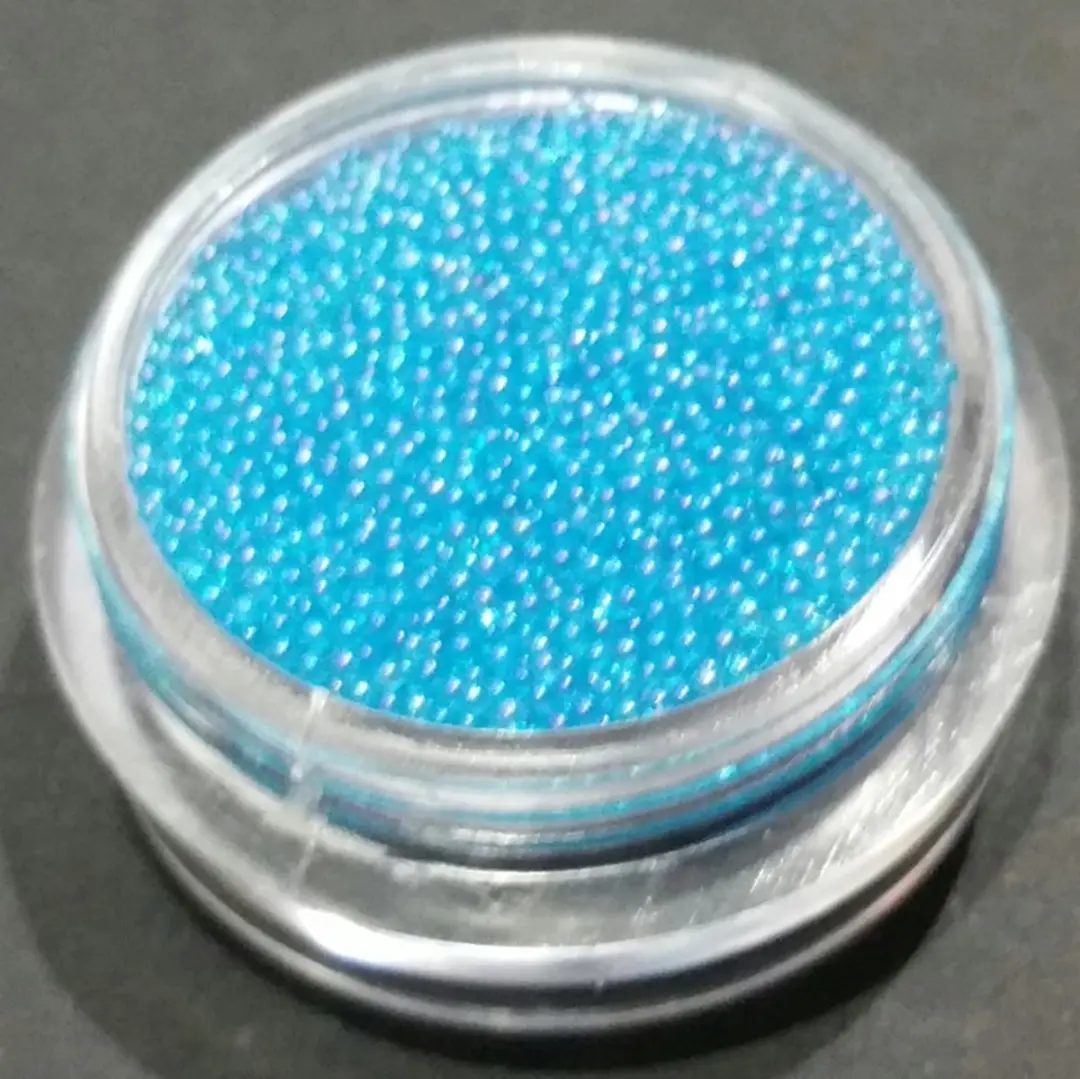 Korneliya Caviar Holografisch Aqua Blauw