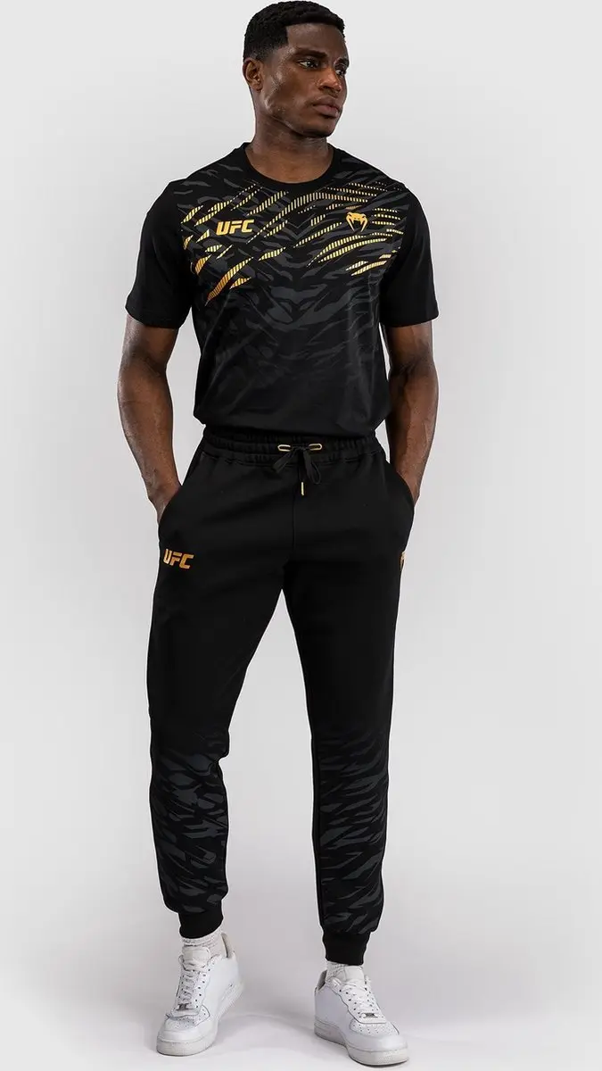 UFC Venum Replica Trainingsbroek Champion - M - Zwart/Goud