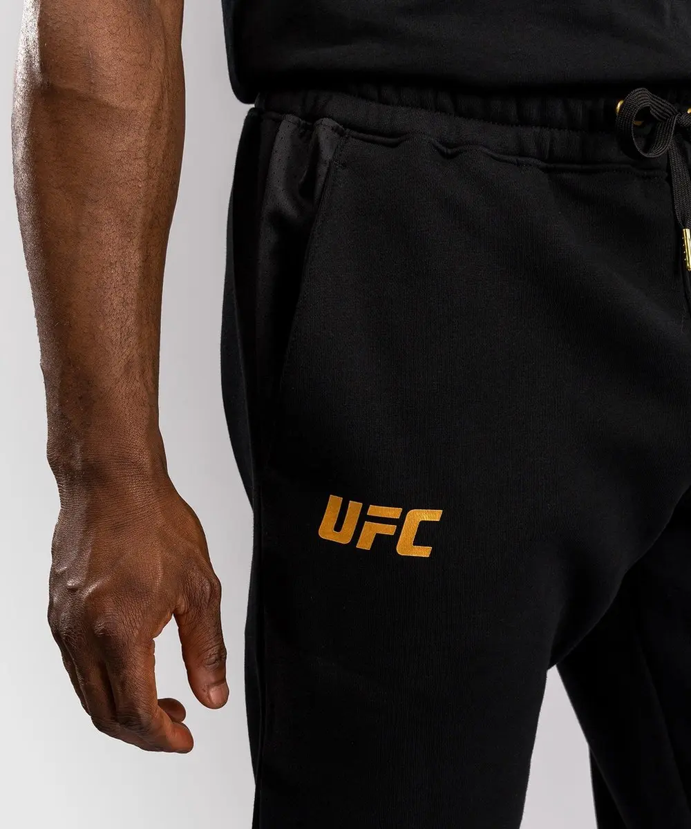 UFC Venum Replica Trainingsbroek Champion - M - Zwart/Goud